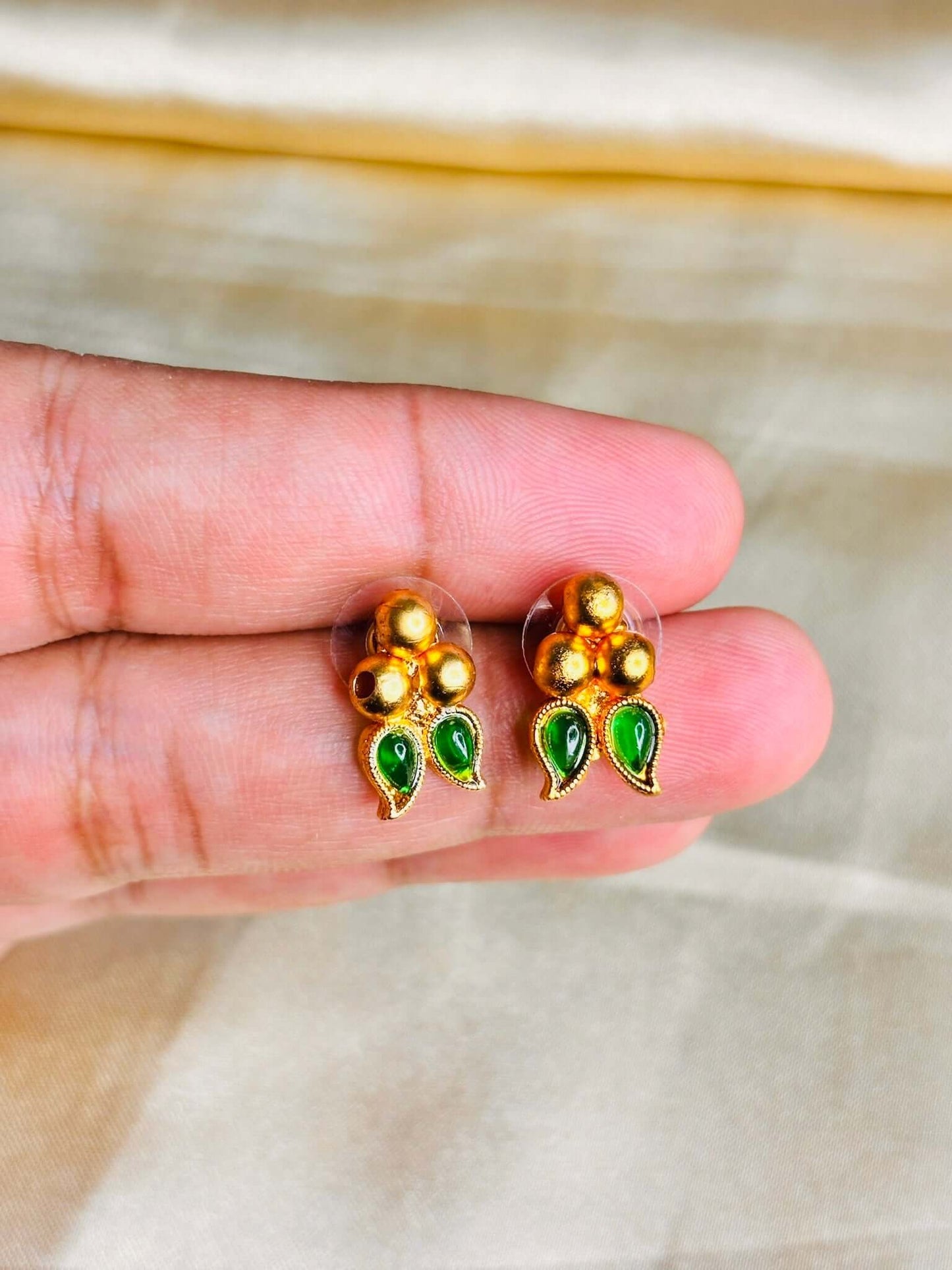 Stylish choker with green hanging beads and gold finish detailing