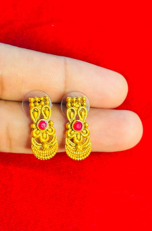 Antique gold necklace featuring peacock design with vibrant stonework