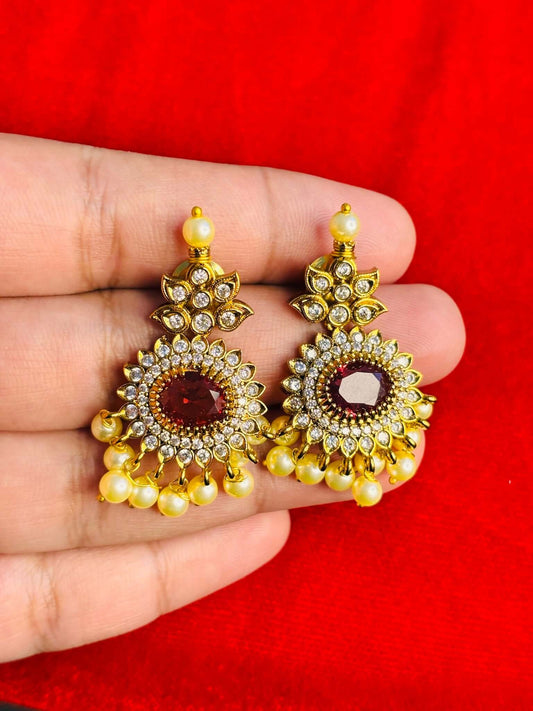 Statement ruby pendant set featuring cubic zirconia and pearl embellishments