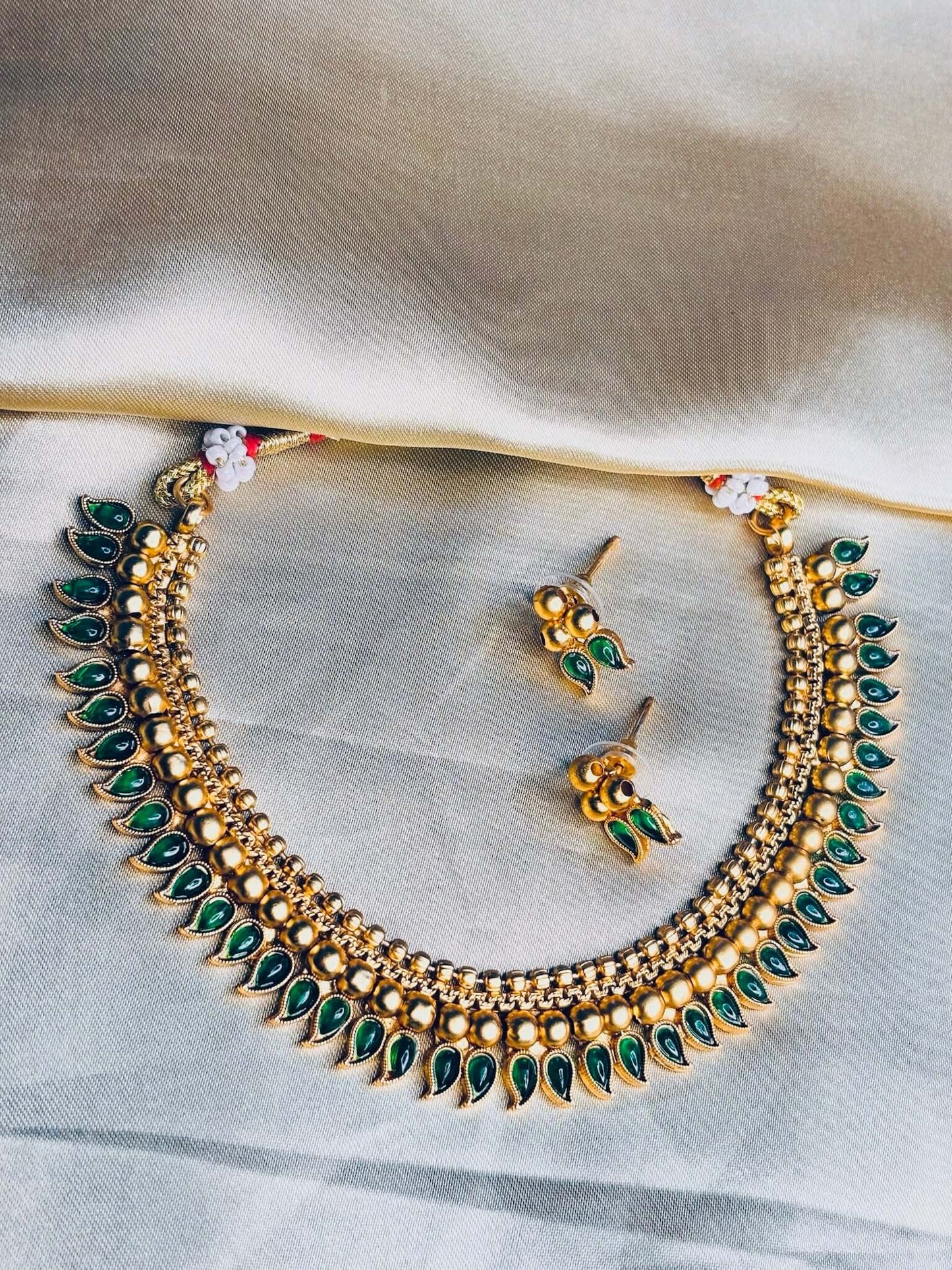 Green drop beaded choker necklace set with matching earrings