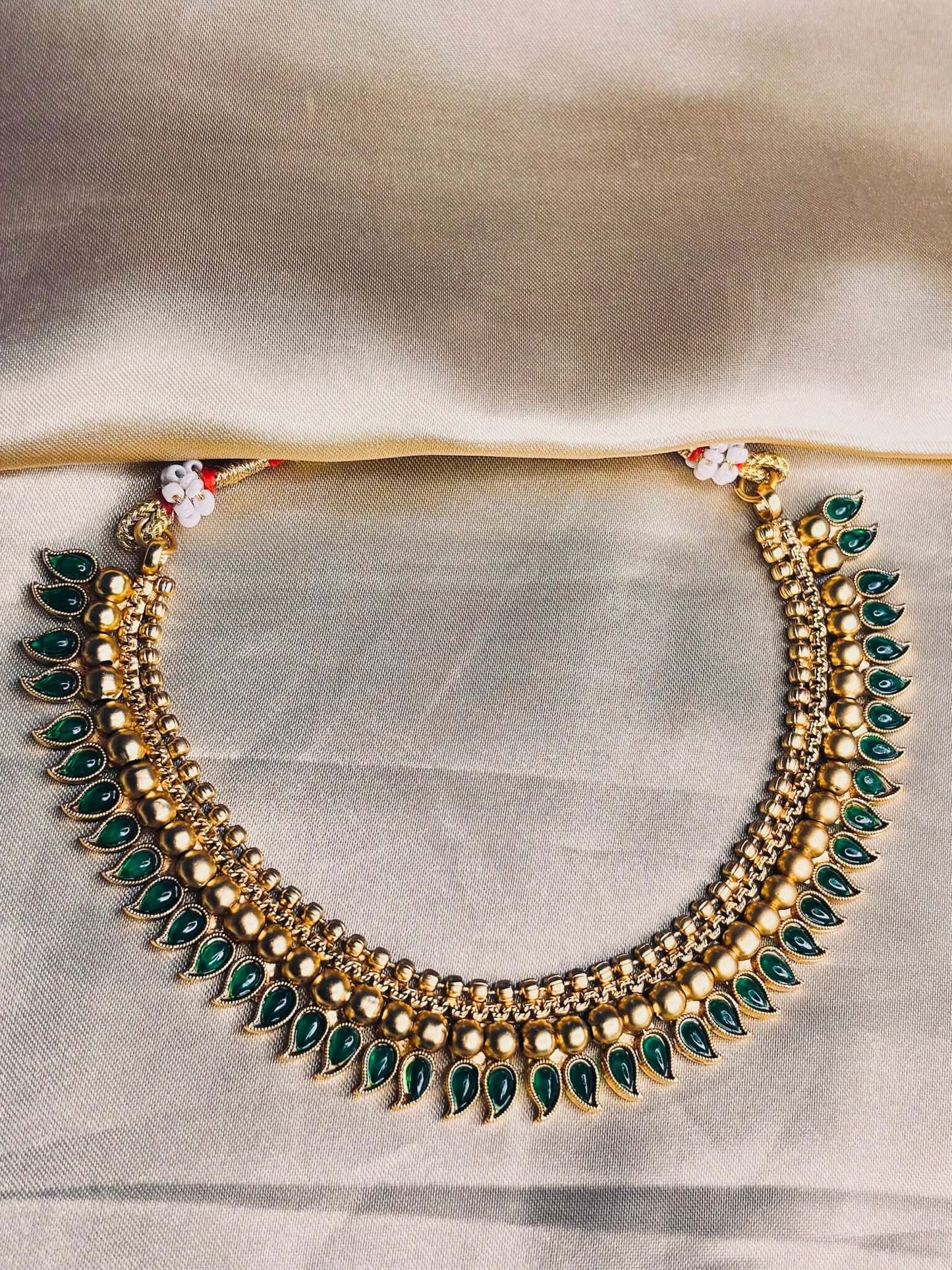 Green drop beaded choker necklace set with matching earrings