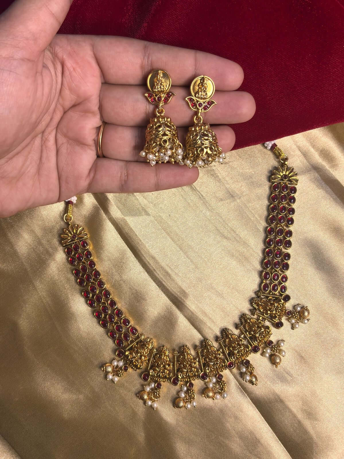 Lakshmi Antique Choker Set with Jhumkas featuring goddess motif and traditional temple jewelry design