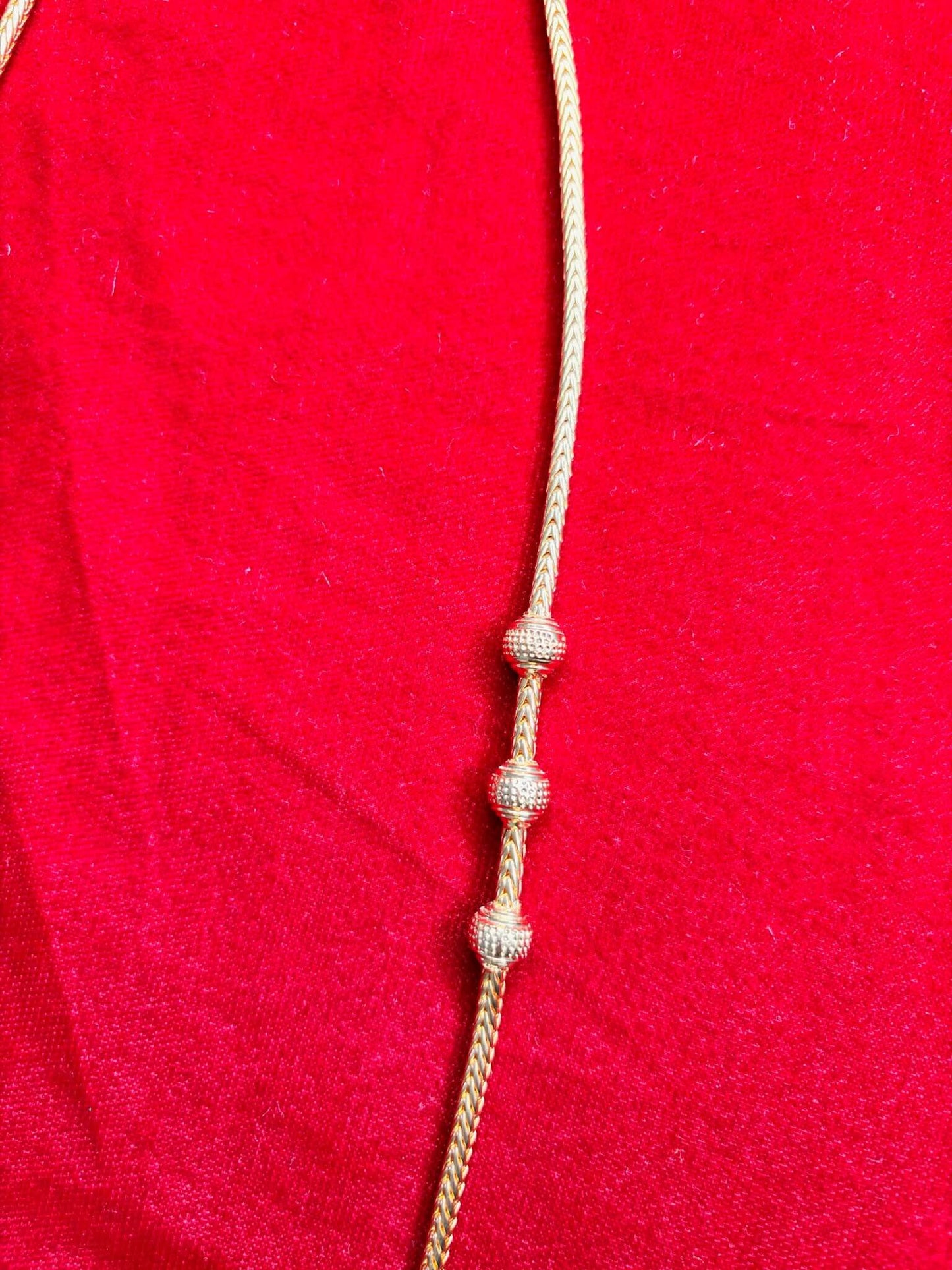 Simple dual-strand mangalsutra chain with classic gold bead highlights