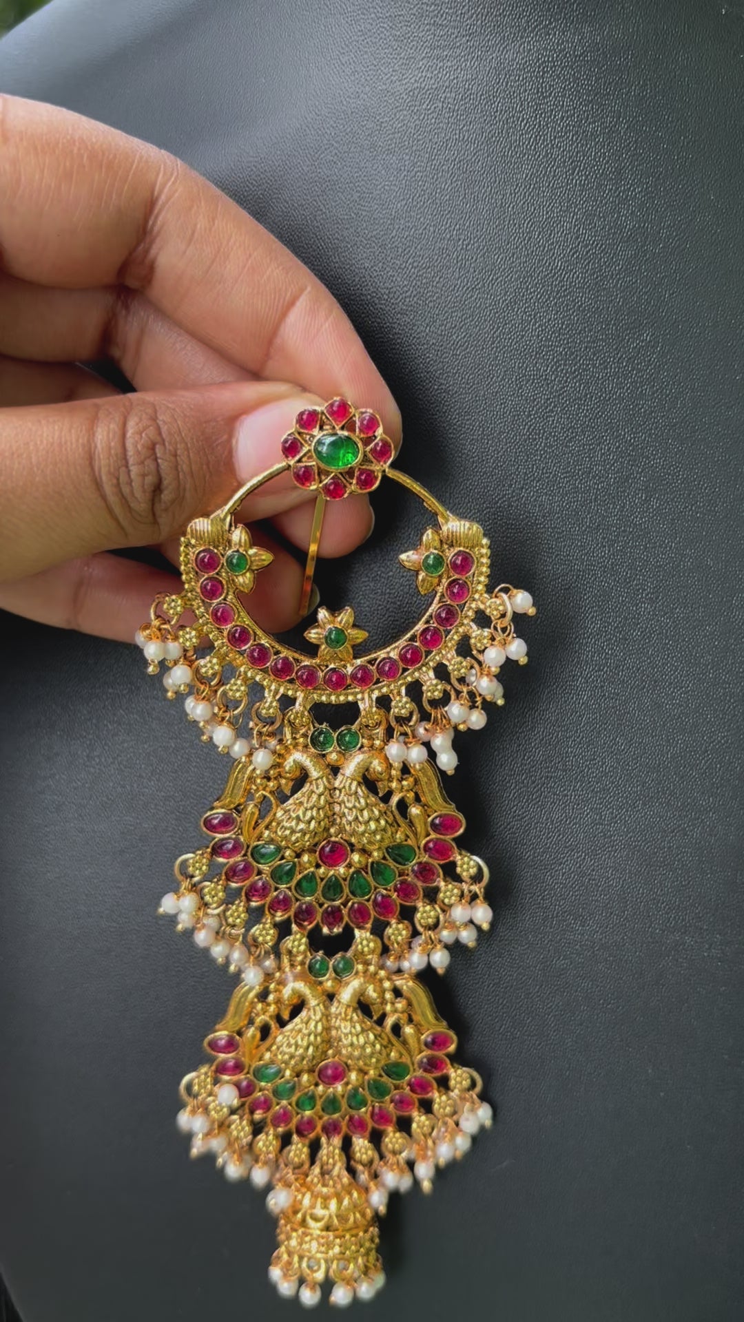 Close-up of handcrafted Jadai Billalu for wedding hairstyles in temple jewelry style